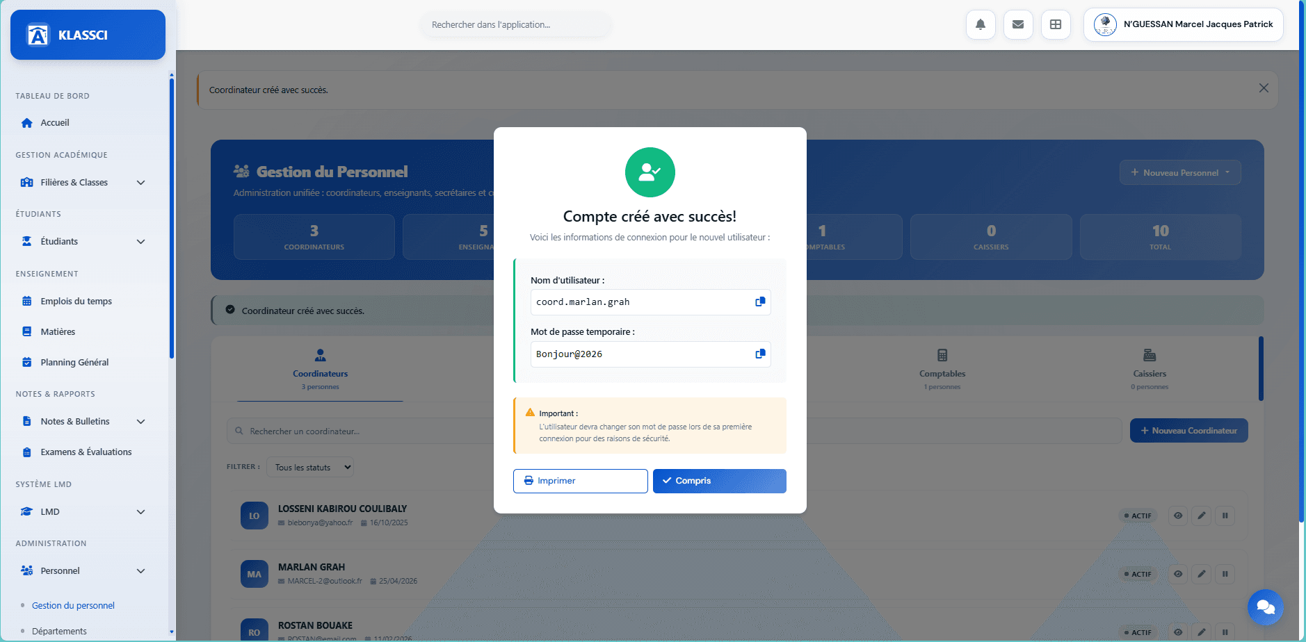 Account-created modal showing the generated username and temporary password